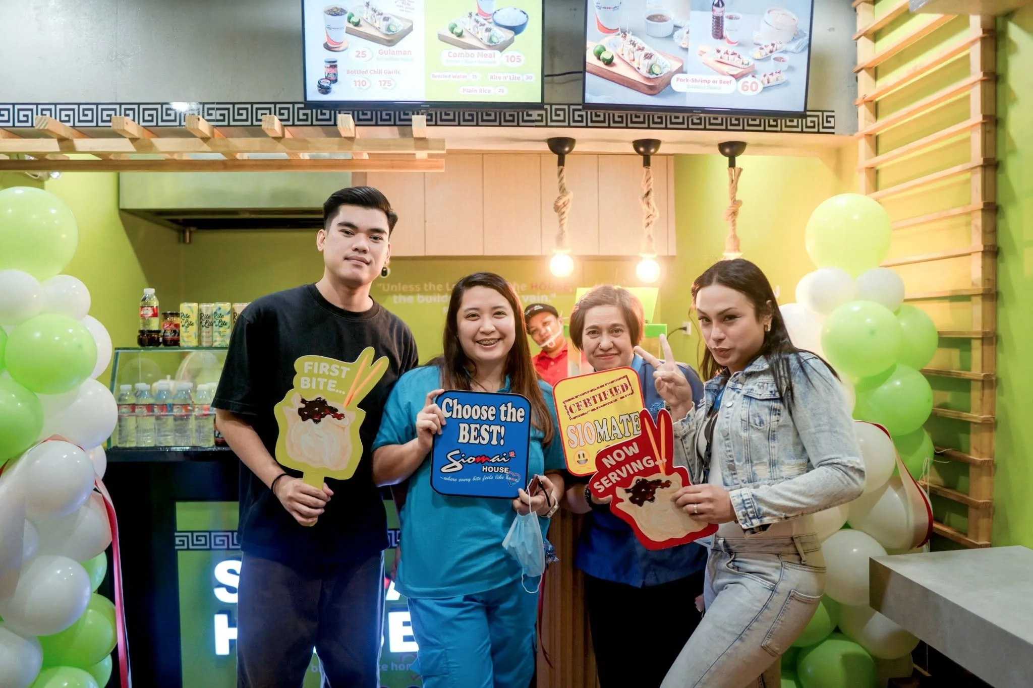 Siomai House team and guests celebrating at a branch opening
