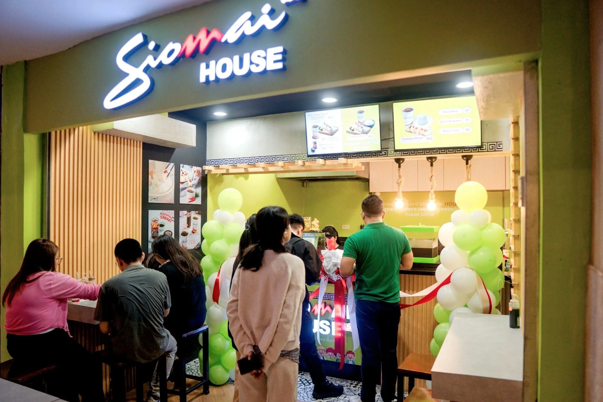 Customers lining up at a newly opened Siomai House branch